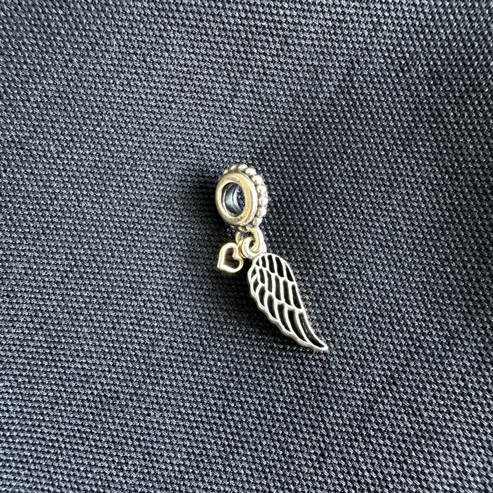 Pandora Angel wing charm with 14k gold heart accent